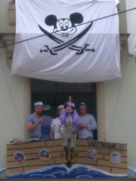A balcony on Louisenstrasse with a different theme every year and the Mickey Mouse flag.